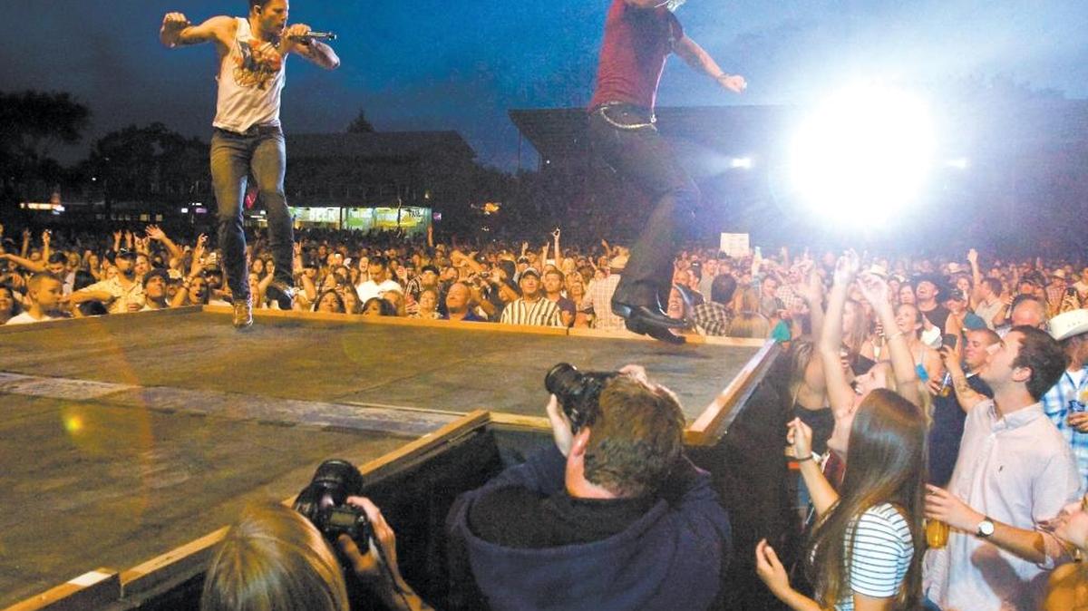 Florida Georgia Line performs to a full house at the California Mid-State Fair in Paso Robles in July 2014. On left is Brian Kelley and right is Tyler Hubbard. Some of the performance venues at the fairgrounds are not covered.