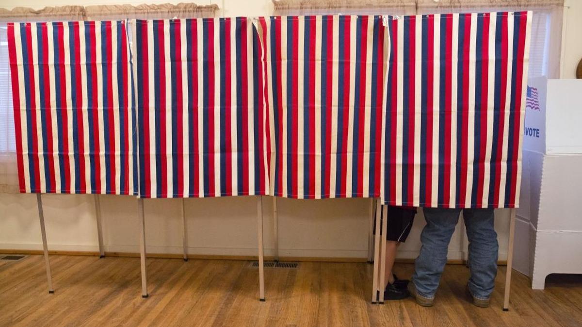 A voter fills out his ballot Nov. 8 in unincorporated Wilson, Idaho.