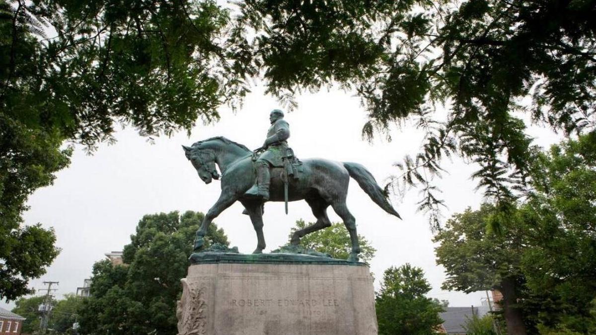 A statue of Confederate general Robert E. Lee sits in Emancipation Park, Tuesday, Aug. 15, 2017, in Charlottesville, Va.