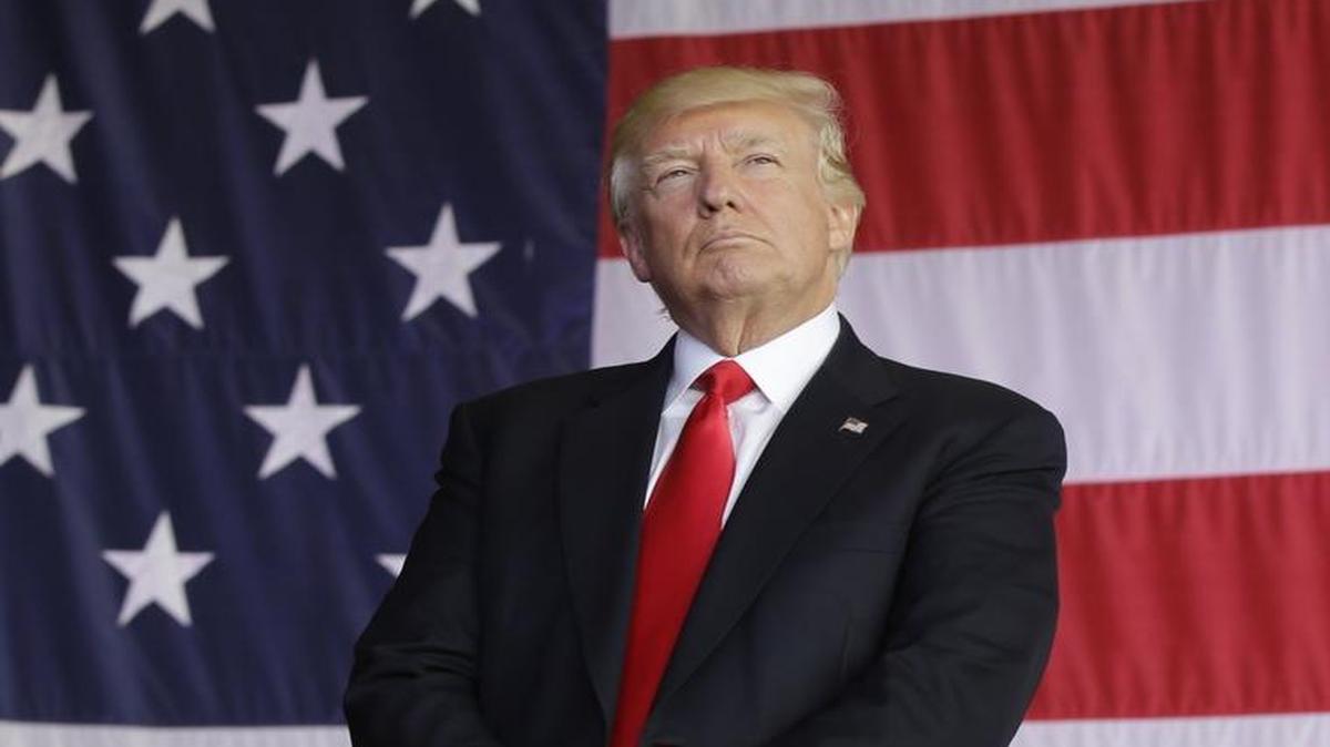President Donald Trump addresses U.S. military troops and their families at the Sigonella Naval Air Station, in Sigonella, Italy, Saturday, May 27, 2017.