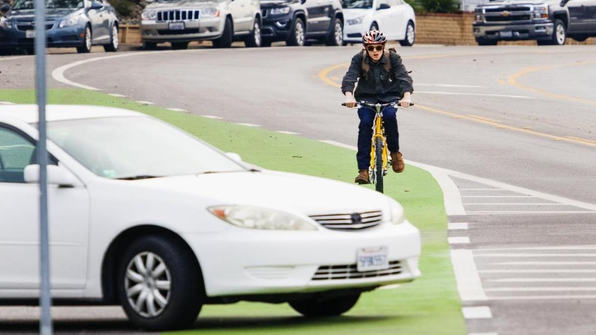 A cyclist bikes towards Cal Poly in the green bike lane along California Blvd. which was added to increase safety for bicyclists. Another biking and pedestrian route, on O’Connor Way in San Luis Obispo, also can be an unsafe location, one letter writer said.