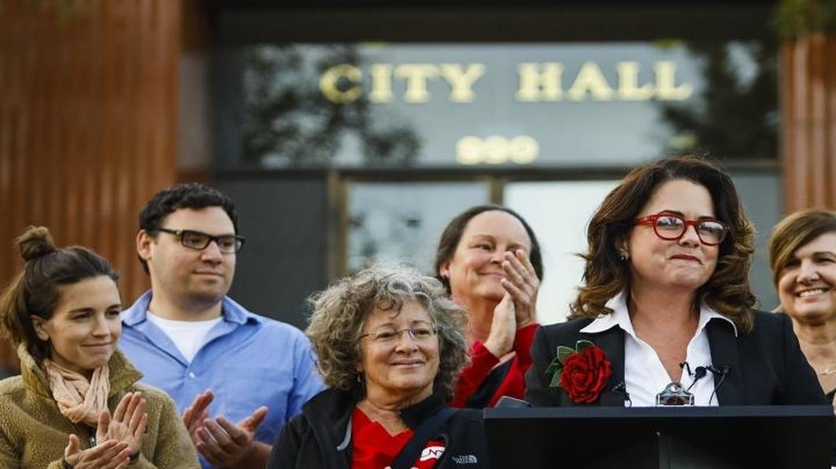 San Luis Obispo mayor-elect Heidi Harmon, surrounded by election staff and supporters, talks of inclusiveness and more during an address in front of City Hall in November.