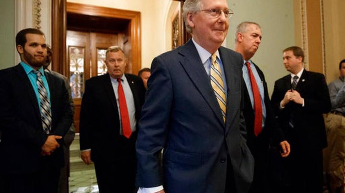 Senate Majority Leader Mitch McConnell of Ky. leaves the Senate chamber on Capitol Hill in Washington, Thursday, July 13, 2017, after announcing the revised version of the Republican health care bill.