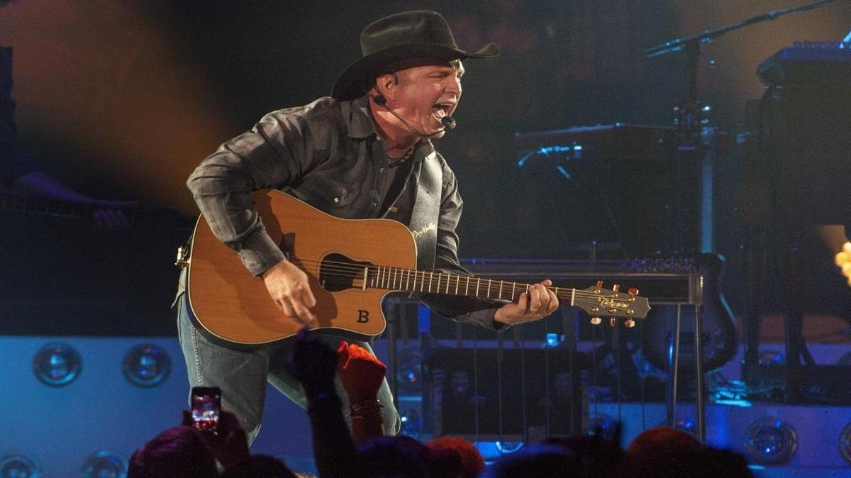 Country music star Garth Brooks kicks off his Garth Brooks World Tour at the Allstate Arena on Thursday, Sept. 4, 2014, in Rosemont, Ill.
