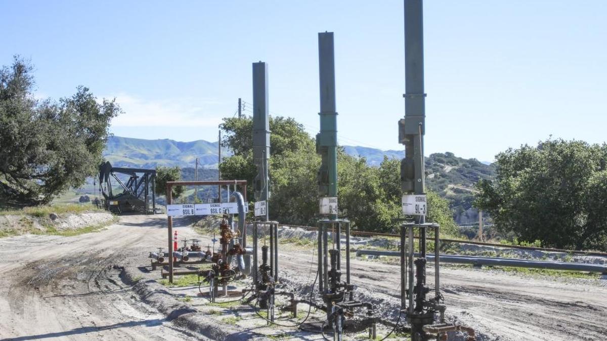 Linear rod pumps at a oil field in Price Canyon.