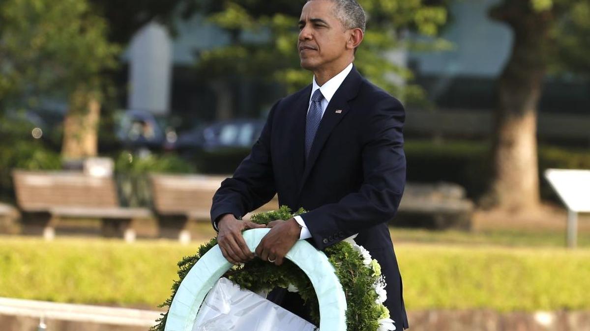 President Barack Obama lay wreaths at the cenotaph at Hiroshima Peace Memorial Park in Hiroshima, western Japan, Friday, May 27, 2016.