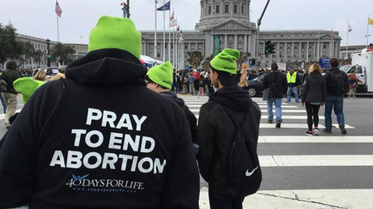 In this Saturday, Jan. 21, 2017 file photo, anti-abortion demonstrators gather at San Francisco City Hall for the 13th annual Walk for Life West Coast march. The collapse of the Republican health care overhaul in March 2017 was a sharp setback for anti-abortion leaders, whose hopes of halting federal funding to Planned Parenthood were derailed. But they continue to pursue that goal and also are pushing for a federal ban on most abortions after 20 weeks of pregnancy.