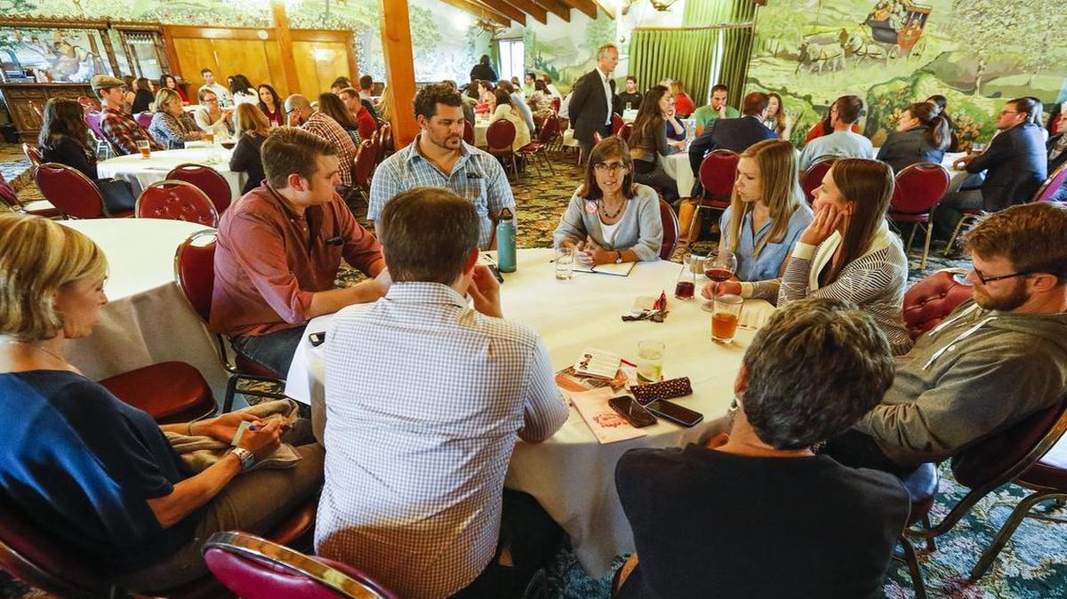 Andy Pease, center, speaks at a SLO Under 40 group during a round table forum for San Luis Obispo City Council and mayoral candidates at the Madonna Inn on Oct. 5.