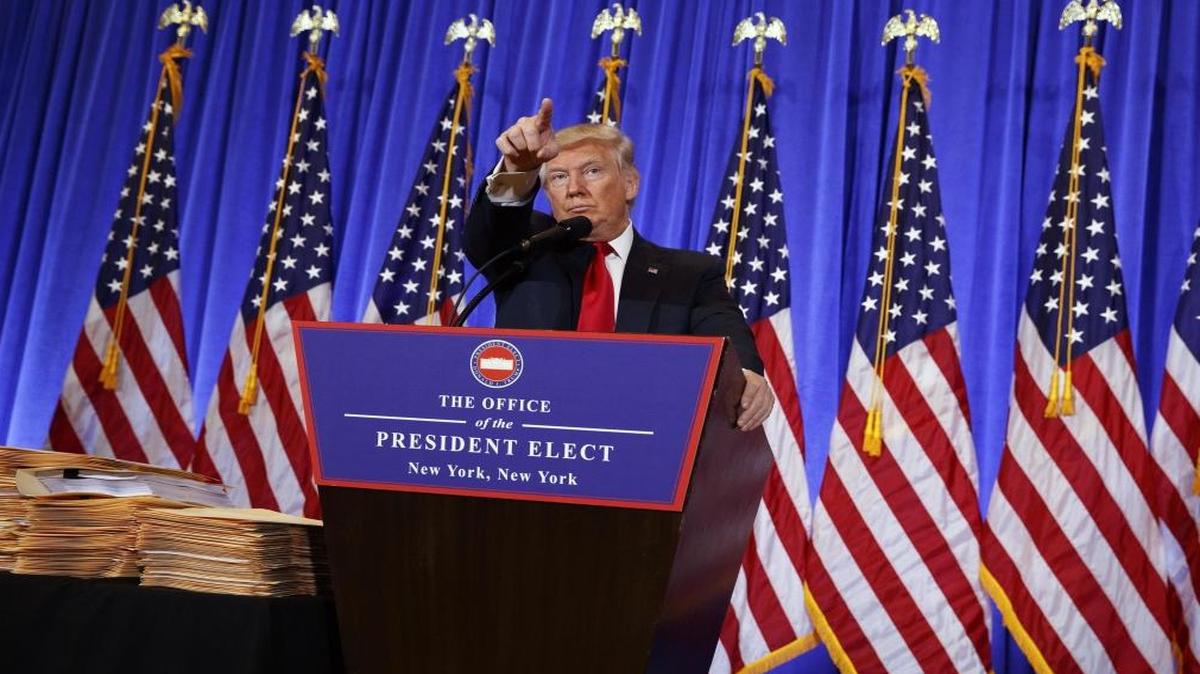 President-elect Donald Trump calls on a reporter during a news conference in the lobby of Trump Tower in New York, Wednesday, Jan. 11, 2017.