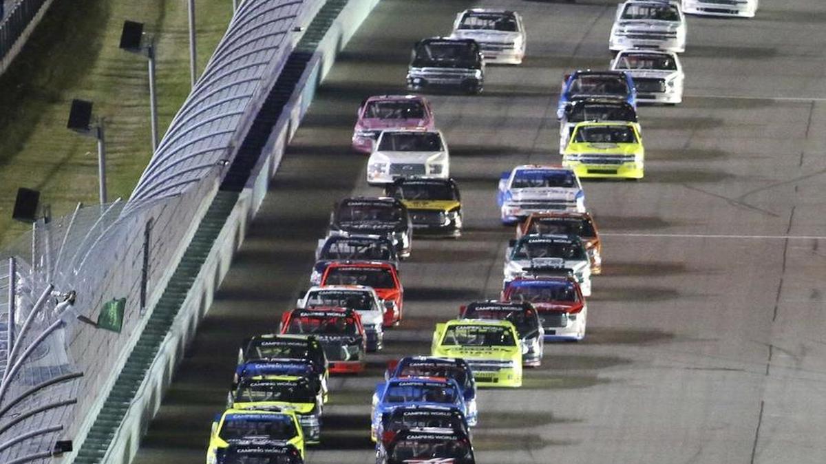 Drivers take the green flag for the start of the NASCAR Trucks auto race Friday.
