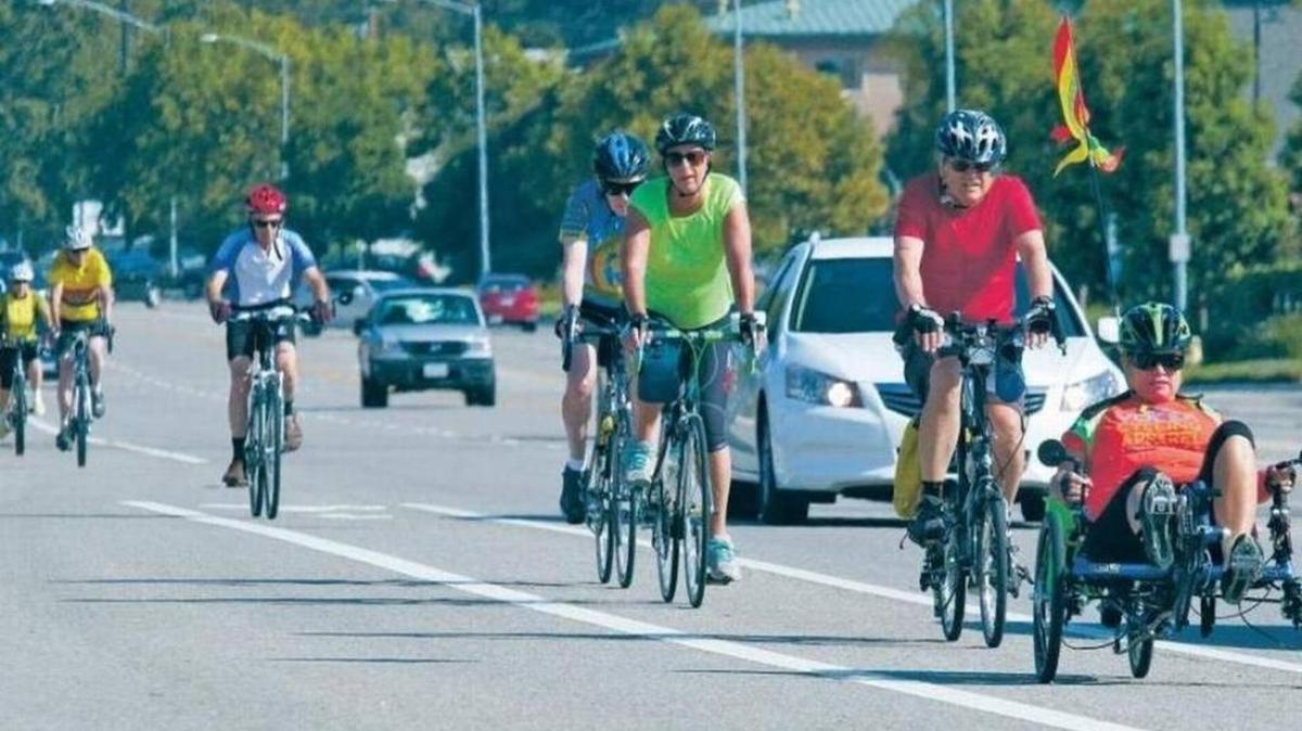 Members of the Tortoise group of the SLO Bicycle Club take a ride along Broad Street in July 2015.
