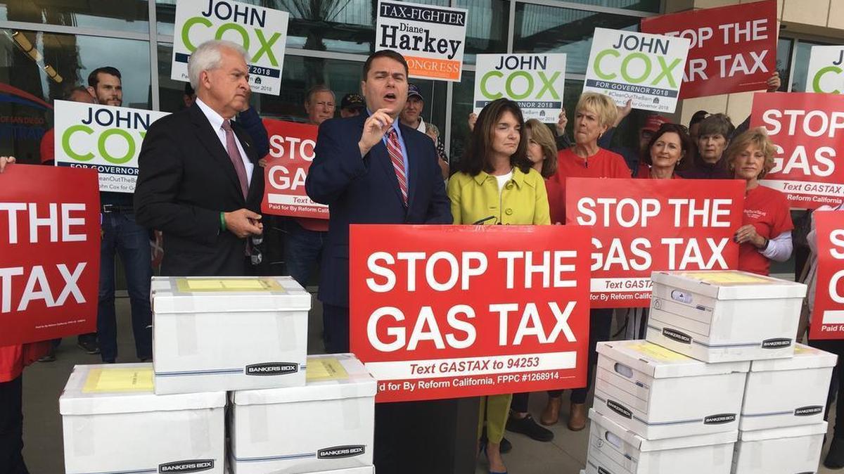 Republican gubernatorial candidate John Cox, left, and organizer Carl DeMaio, center, led a petition drive backed by conservatives to repeal California’s gas taxes and vehicle registration fees in 2018. Gas tax opponents complained to the state’ s Fair Political Practices Commission that public funds had been used to support the gas tax. The repeal effort failed.