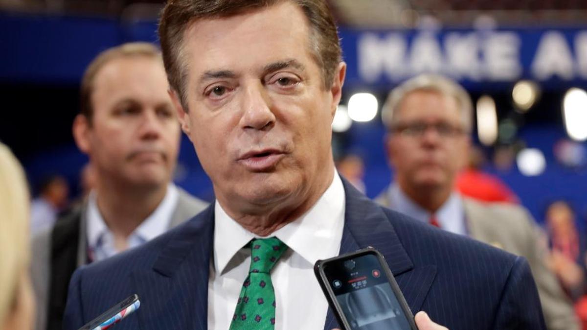 In this July 17, 2016 file photo, Trump campaign’s then-chairman, Paul Manafort, talks to reporters on the floor of the Republican National Convention at Quicken Loans Arena in Cleveland.