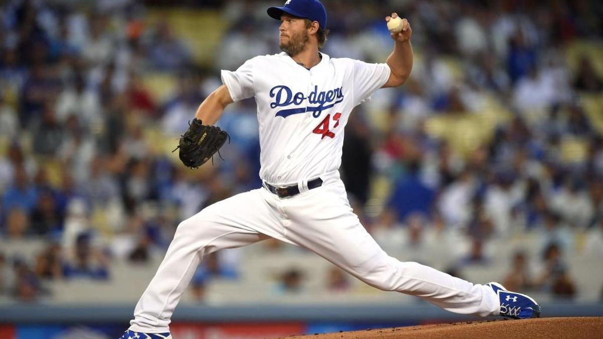 Los Angeles Dodgers starting pitcher Clayton Kershaw throws to the plate during the first inning of a baseball game against the San Francisco Giants on Friday, April 15, 2016, in Los Angeles.