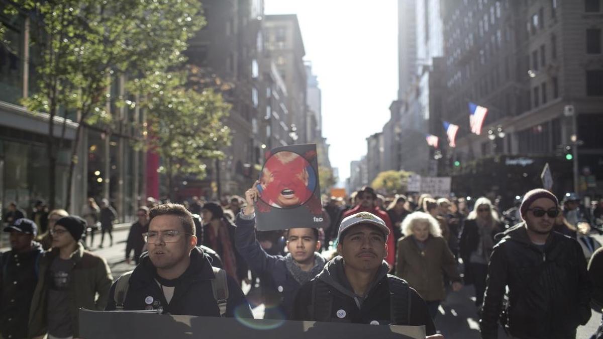 Demonstrators march to protest President-elect Donald Trump in New York, Nov. 12, 2016.