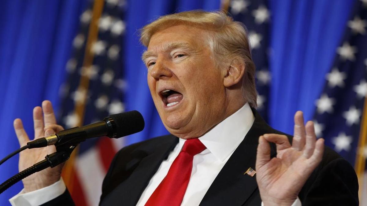 In this Jan. 11, 2017 file photo, President-elect Donald Trump speaks during a news conference in the lobby of Trump Tower in New York.