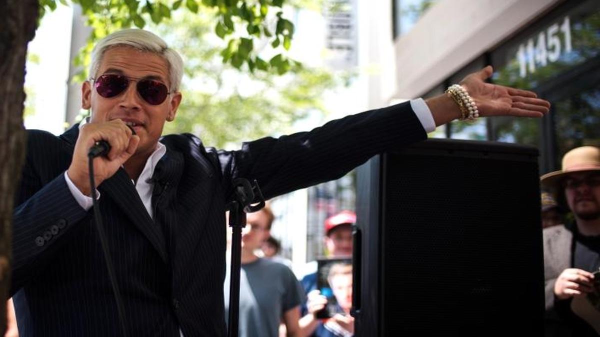 Milo Yiannopoulos, the Breitbart writer and “alt-right” personality, speaks with reporters at the Republican National Convention in Cleveland, July 19, 2016.