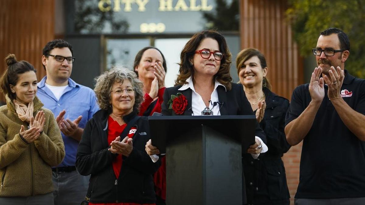 Heidi Harmon, San Luis Obispo’s recent;y elected mayor-elect, surrounded by election staff and supporters, talks of inclusiveness and more during an address in front of City Hall in November 2016.