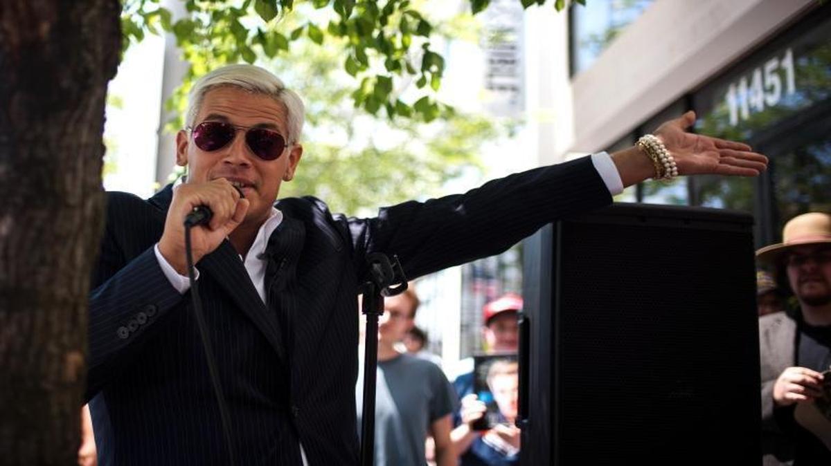 Milo Yiannopoulos, the Breitbart writer and “alt-right” personality, speaks with reporters at the Republican National Convention in Cleveland, July 19, 2016.