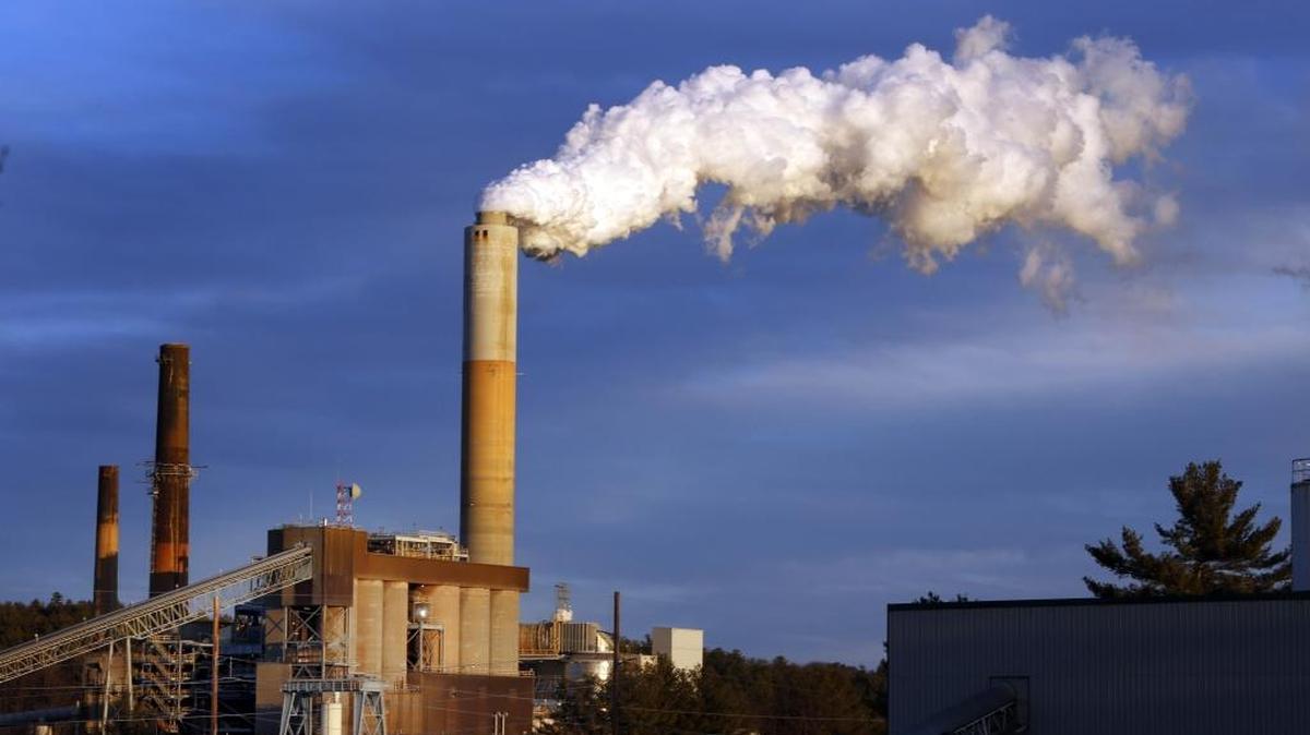 In this Jan. 20, 2015 file photo, a plume of steam billows from the coal-fired Merrimack Station in Bow, N.H. President Donald Trump said the United States âwill continue to be the cleanest and most environmentally friendly country on Earthâ as he announced pulling out of an international accord designed to curb climate change.