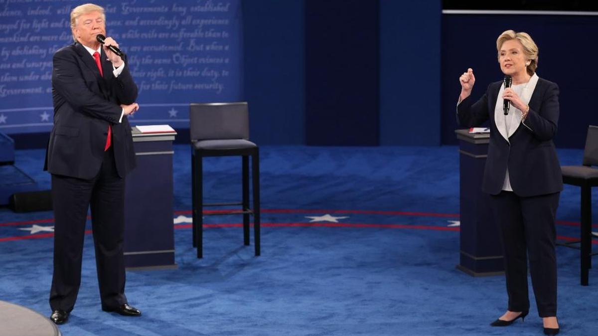 Hillary Clinton, right, and Donald Trump debate at Washington University in St. Louis on Oct. 9, 2016.