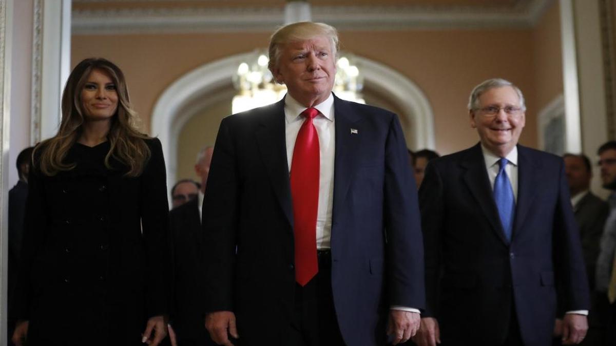 President-elect Donald Trump and his wife, Melania, walk with Senate Majority Leader Mitch McConnell of Kentucky on Capitol Hill on Thursday.
