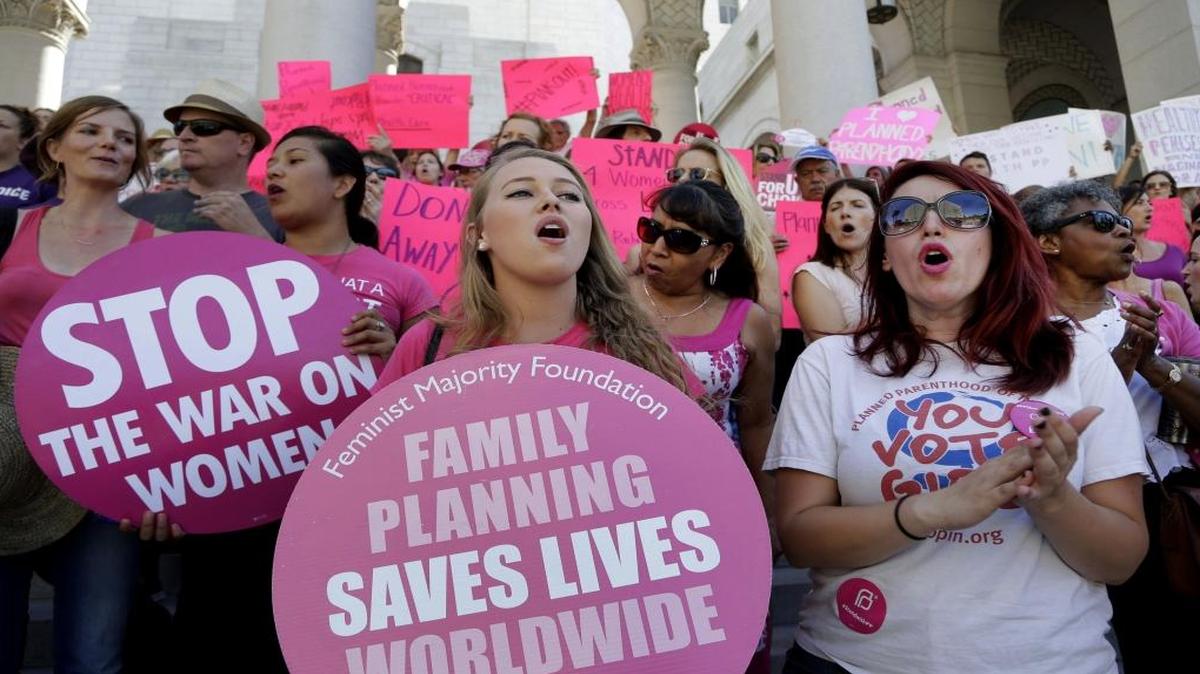 Planned Parenthood supporters rally for women's access to reproductive health care on "National Pink Out Day'' at Los Angeles City Hall in 2015.