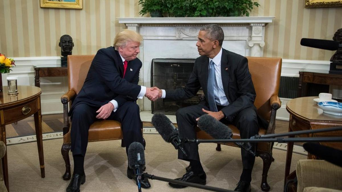 President Barack Obama shakes hands with President-elect Donald Trump in the Oval Office.
