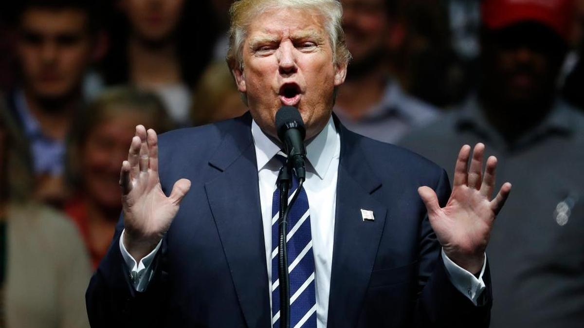 President-elect Donald Trump speaks to supporters during a rally, in Grand Rapids, Mich., on Dec. 9.