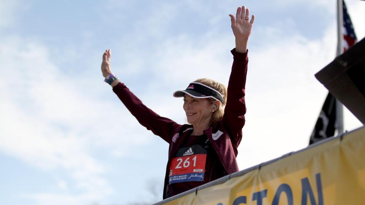 Kathrine Switzer, who was the first official woman entrant in the Boston Marathon 50 years ago, acknowledges the crowd as she is introduced before firing the gun to start the women’s elite division at the start of the 2017 Boston Marathon in Hopkinton, Mass., on Monday, April 17, 2017.