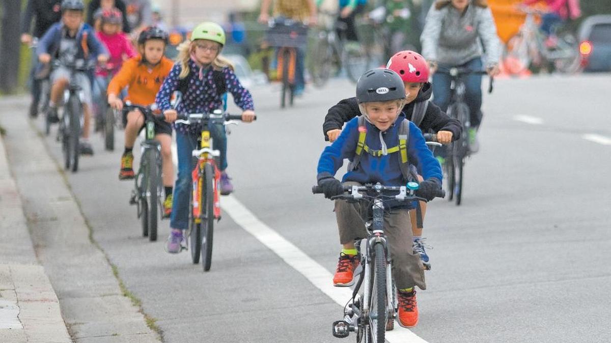 Pacheco Elementary students cross Foothill Blvd. as parents and students participate in Bike and Walk to School Day in May.