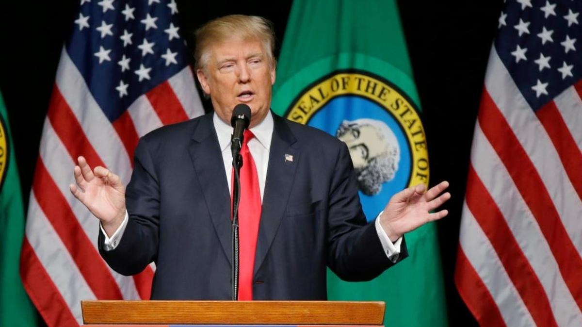 In this photo taken May 7, Republican presidential candidate Donald Trump speaks during a rally in Spokane, Wash.