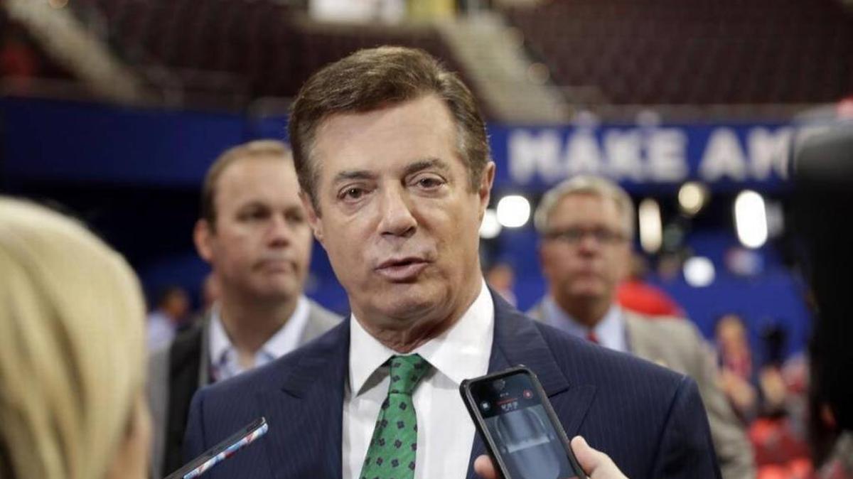 Trump Campaign Chairman Paul Manafort talks to reporters on the floor of the Republican National Convention at Quicken Loans Arena, Sunday, July 17, 2016, in Cleveland.