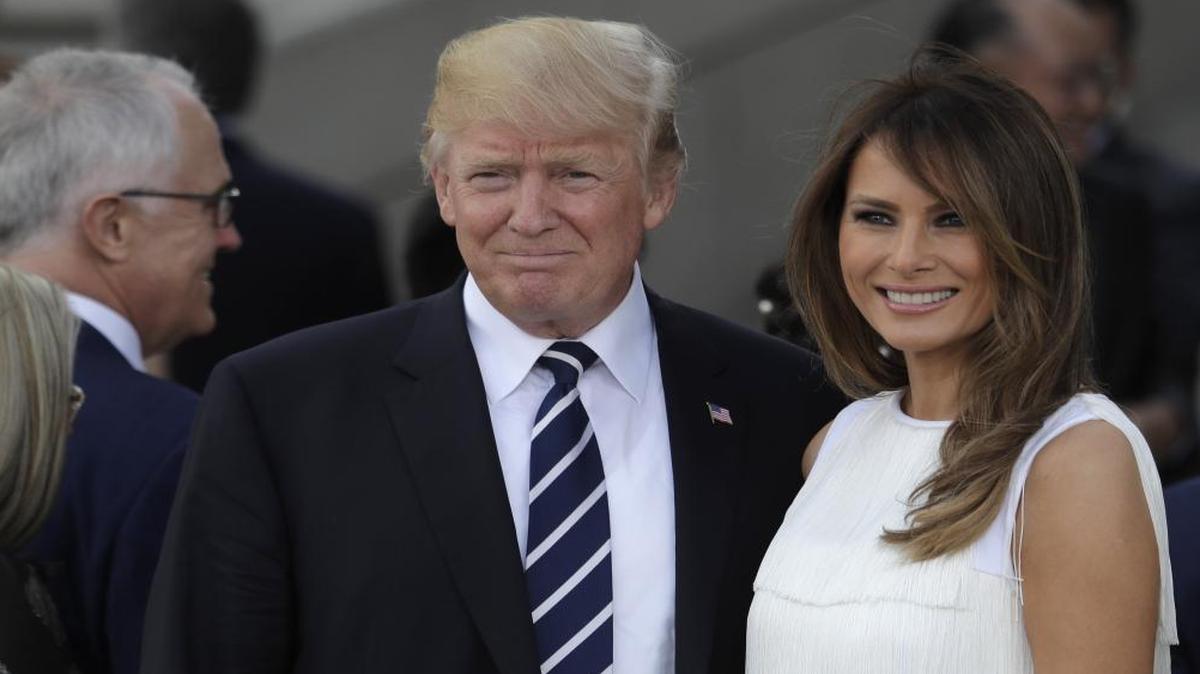 U.S. President Donald Trump, left, and his wife Melania smile prior to a concert on the first day of the G-20 summit in Hamburg, northern Germany, Friday, July 7, 2017. The leaders of the group of 20 meet July 7 and 8.