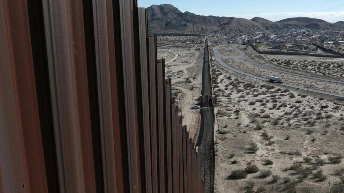 On Jan. 25, 2017, a truck drives on the Mexican side of the Mexico-U.S. border fence, which separates the towns of Anapra, Mexico, and Sunland Park, New Mexico.