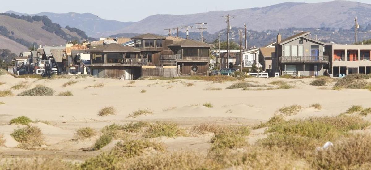 A view from the Oceano Dunes State Vehicular Recreation Area looks toward homes along the beach in Oceano.