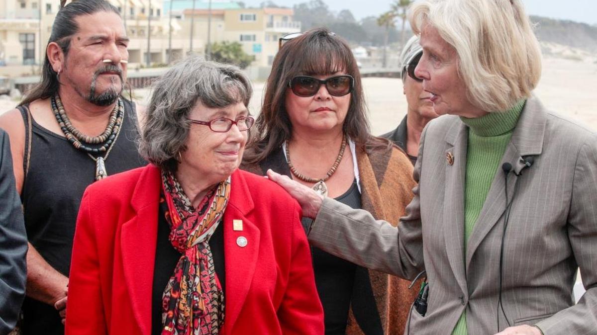 Lois Capps gave a speech on the proposed marine sanctuary at the foot of the Pismo Pier, and here introduces San Luis Obispo Mayor Jan Marx. Behind them are Matiwaiya [only gave one name] Ceremonial Elder with Wishtoyo Chumash Foundation and Luhui Ishi Cultural Resources and Education Director with the same organization.
