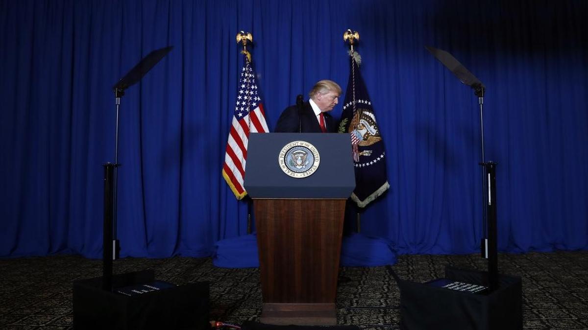 President Donald Trump walks from the podium after speaking at Mar-a-Lago in Palm Beach, Fla., Thursday, April 6, 2017, after the U.S. fired a barrage of cruise missiles into Syria.