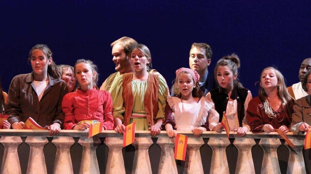Members of the Central Coast Children’s Choir perform in “Carmen” at the PAC in 2013 in collaboration with OperaSLO.
