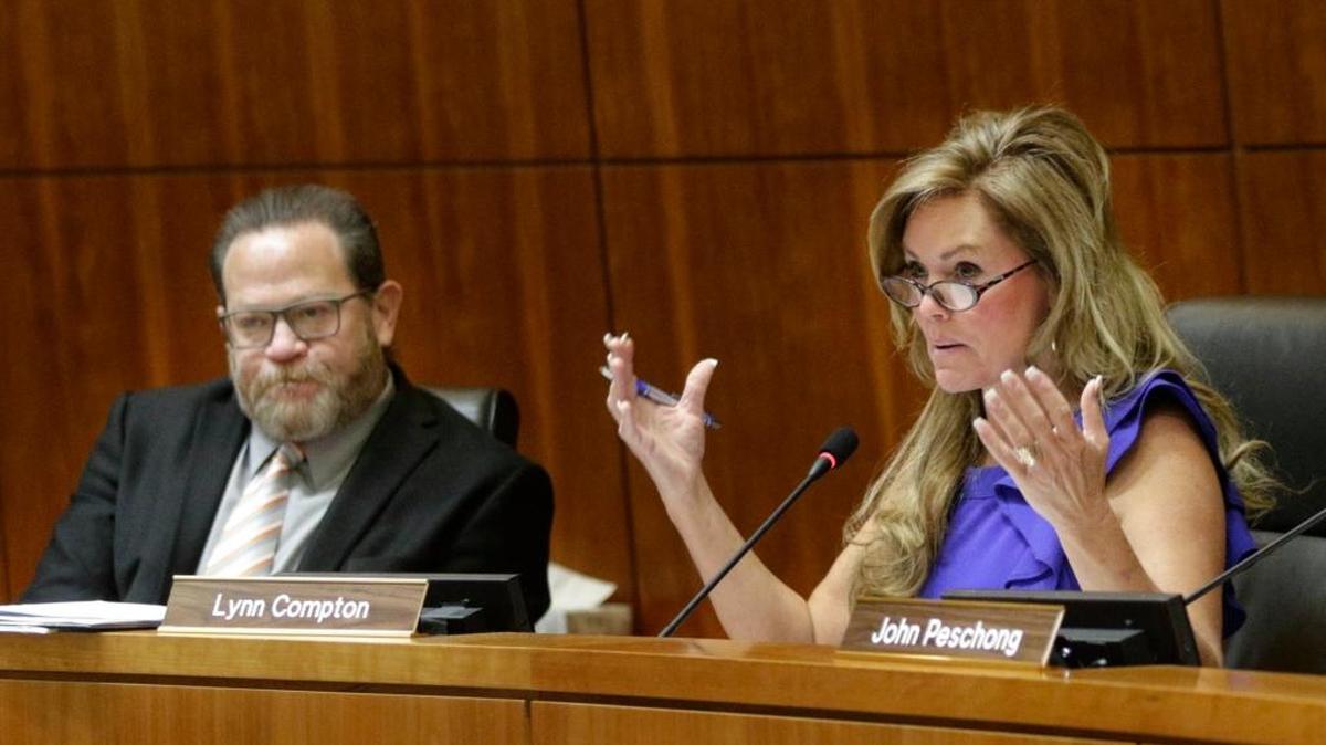 Adam Hill, left and Lynn Compton