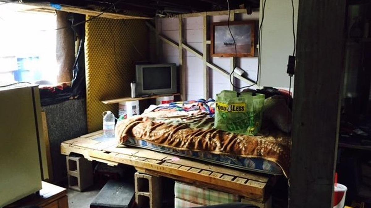 A garage is illegally converted into housing in San Luis Obispo. The photo was included in a presentation made in 2015 to the City Council illustrating health and safety concerns in rental properties in the city.