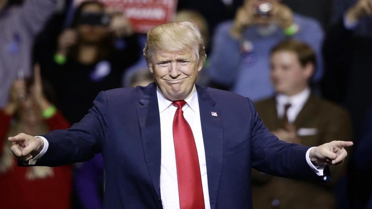 President-elect Donald Trump greets supporters during a rally in Fayetteville, N.C., Tuesday, Dec. 6, 2016.