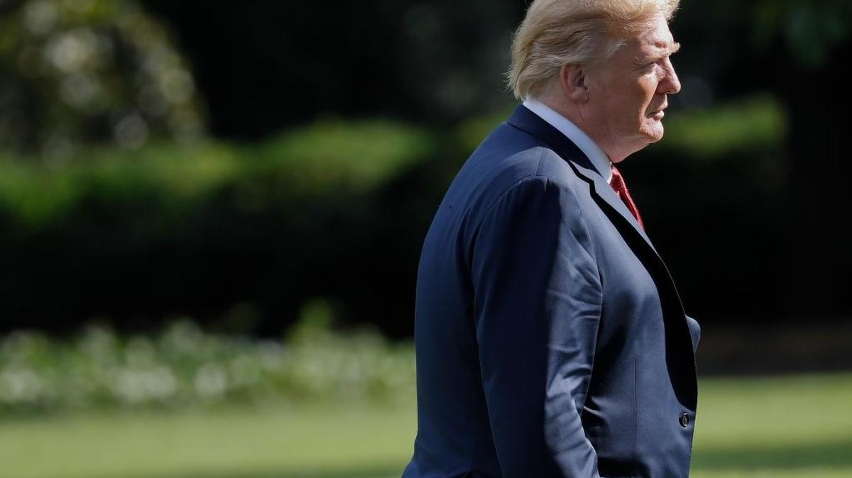 President Donald Trump walks across the South Lawn of the White in Washington, Thursday, June 28, 2018, following his arrival on Marine One helicopter.
