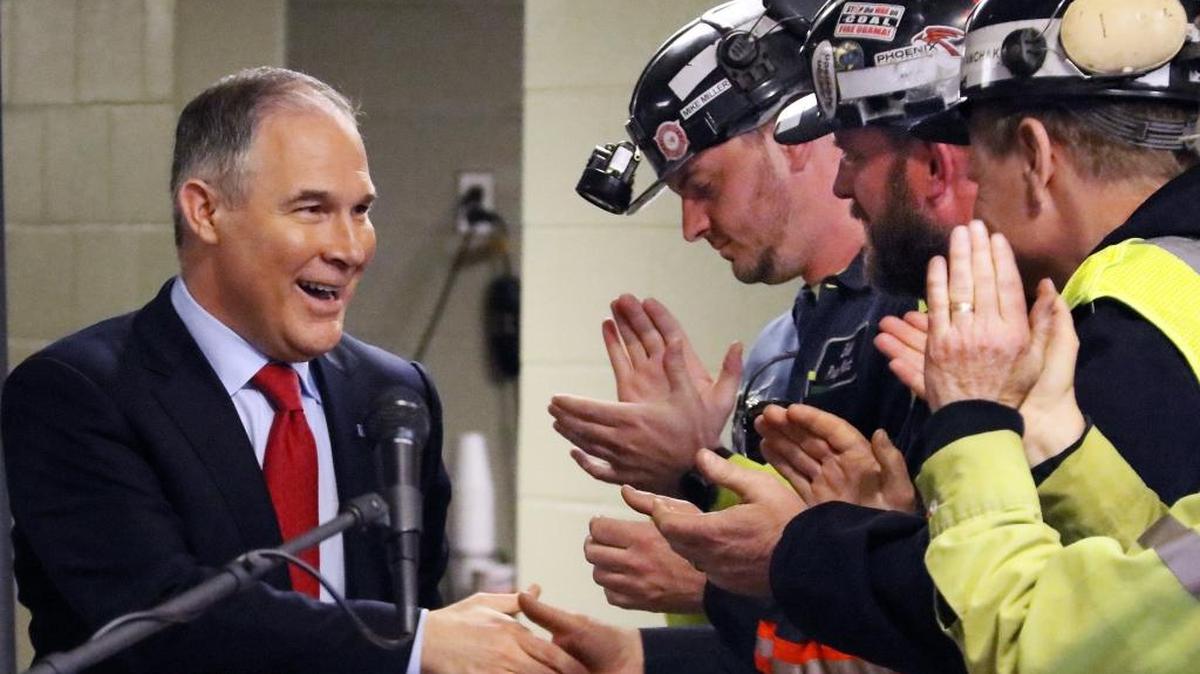 U.S. Environmental Protection Agency Administrator Scott Pruitt, left, shakes hands with coal miners during a visit to Consol Pennsylvania Coal Company's Harvey Mine in Sycamore, Pa., Thursday, April 13, 2017.