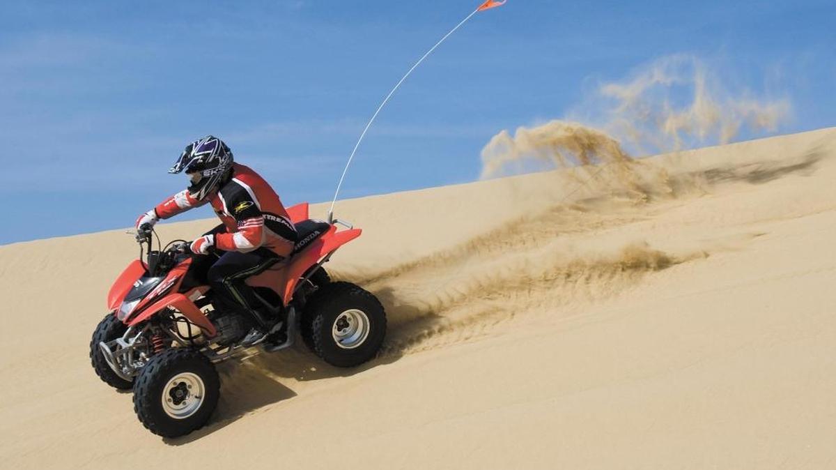 Nathan Sedlaczek, 13, rides a quad with his family at Oceano Dunes State Vehicular Recreation Area in 2018. 