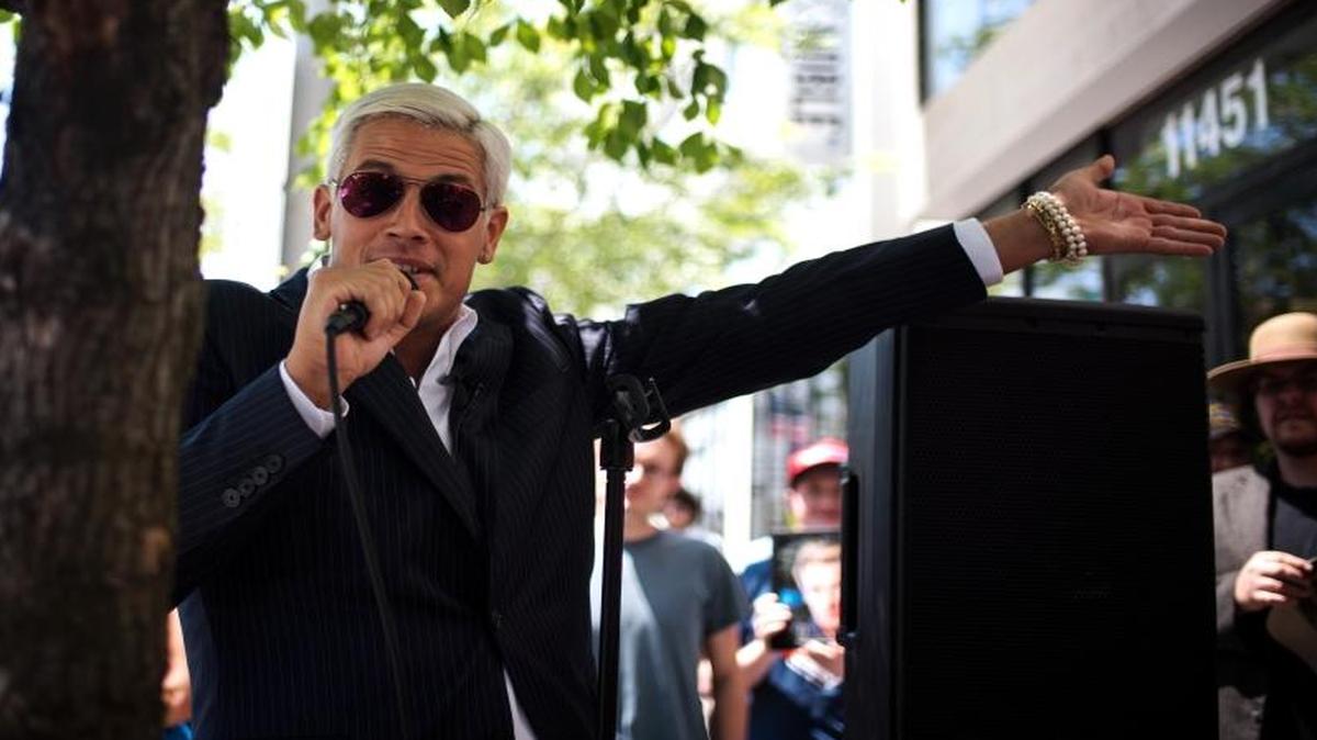 Milo Yiannopoulos, the Breitbart writer and “alt-right” personality, speaks with reporters July 19, 2016 at the Republican National Convention in Cleveland.