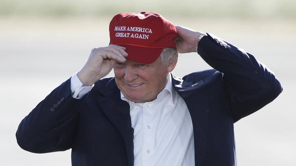 Republican presidential candidate Donald Trump wears his "Make America Great Again" hat.