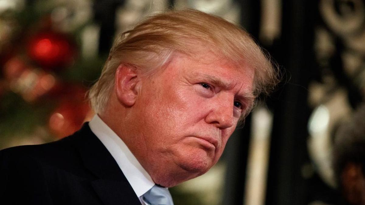 President-elect Donald Trump listens to a question as he speaks to reporters at Mar-a-Lago on Dec. 28, 2016, in Palm Beach, Fla.