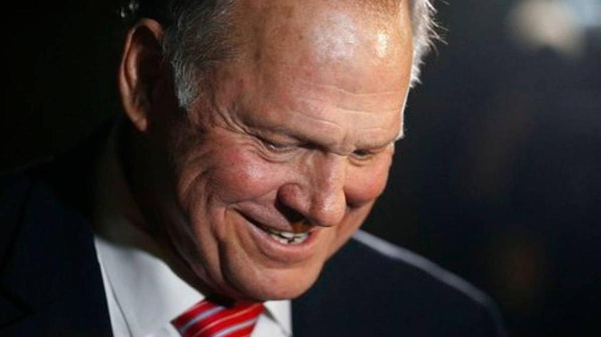 Former Alabama Chief Justice and U.S. Senate candidate Roy Moore leaves after he speaks at a church revival, Tuesday, Nov. 14, 2017, in Jackson, Ala.