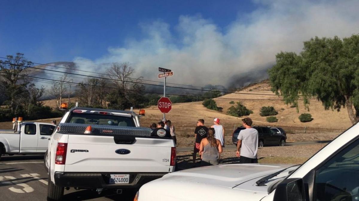 Some students were evacuated from their dorms when the Poly Fire near the Cal Poly P broke out on Tuesday, September 26, 2017.